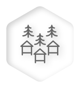 icône de petites maisons à la lisère d'une forêt sapins